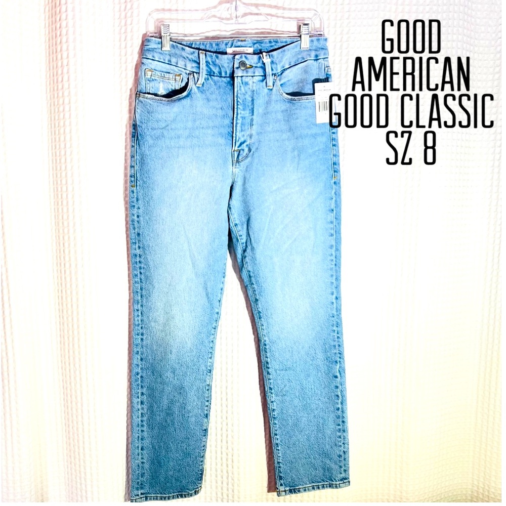 Good American Women med blue light jean high waist ,cool classic, distress Sz 8